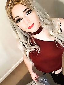 High heel sandals and black hold-up stockings.