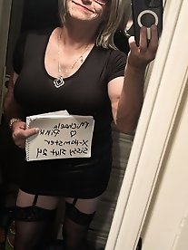 A slender transgender woman is pleasuring herself