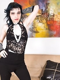 A seductive transgender beauty models enticing lingerie