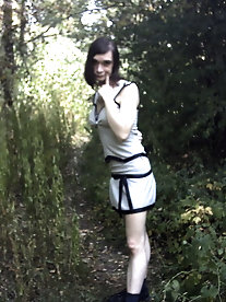 Sexy-shaped t-girl harlot is spreading her legs for a photoshoot