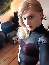 Smiling shemale girlfriend puts on sexy panties