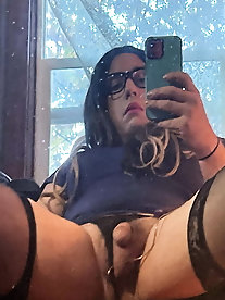 Shemale prostitute is taking off her clothes for money