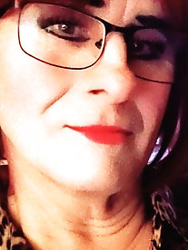 Flawless tranny GF is posing almost undressed on pix